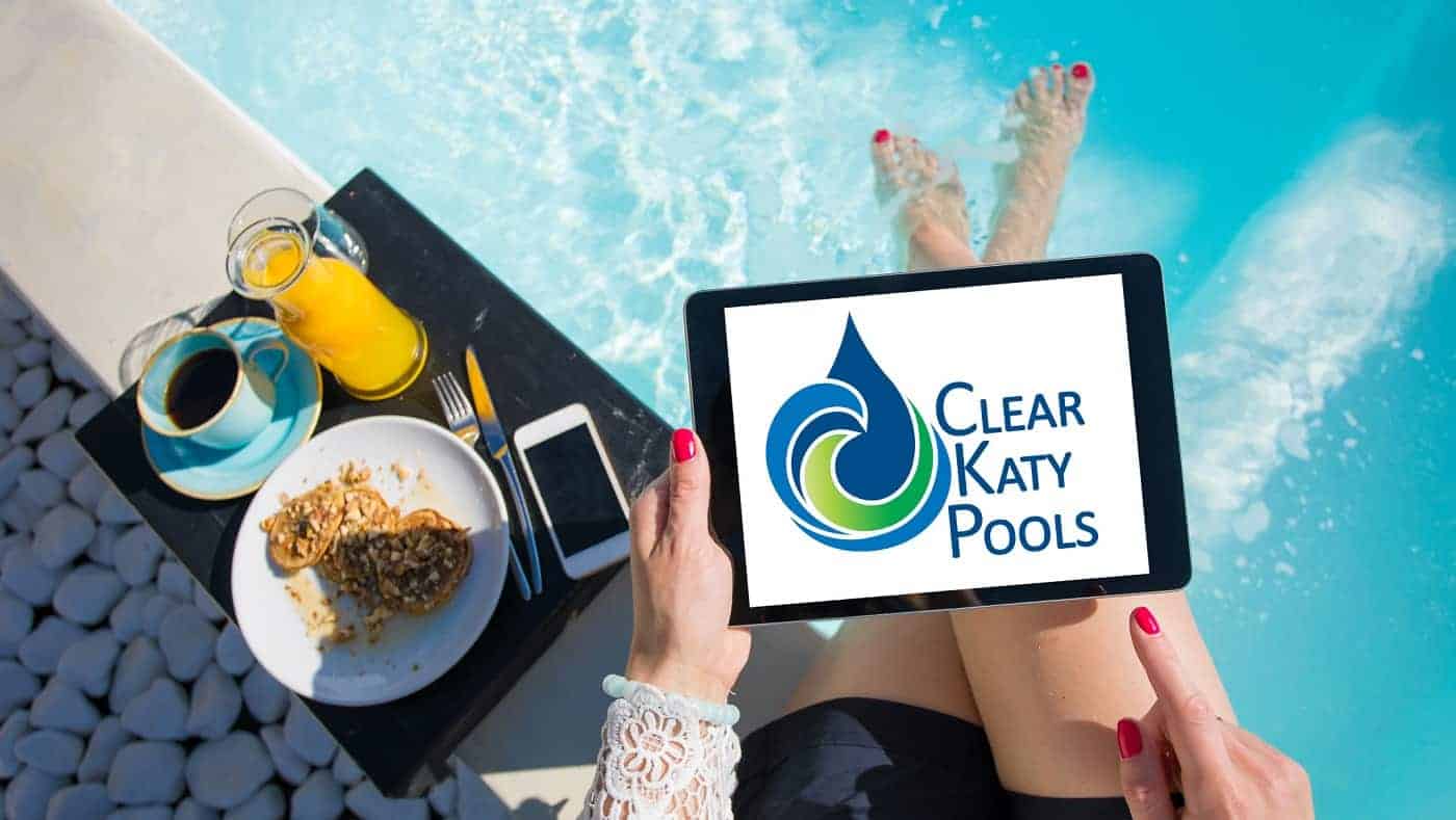 Clear Katy Pools logo on an Ipad