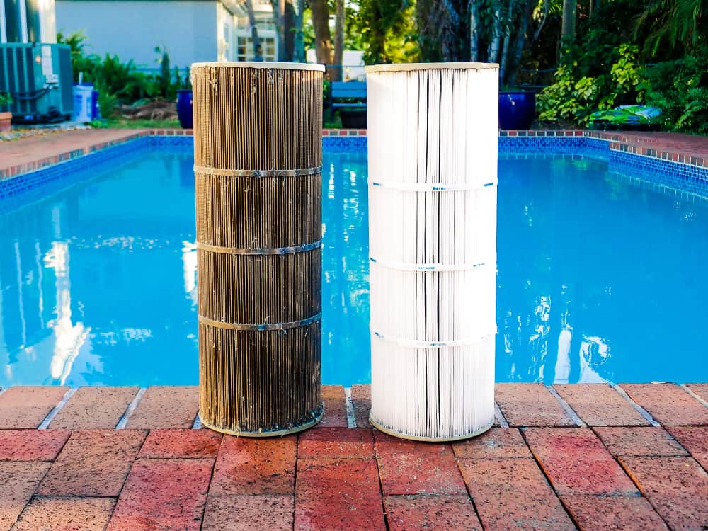 dirty and clean pool filter cartridges next to each other
